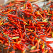 Red chili pepper (piri-piri) on famous market in Funchal (Mercado dos Lavradores), Madeira island, Portugal Piri-Piri Chilis